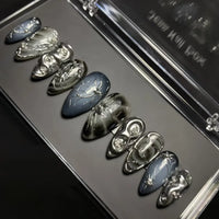 Katie | Women's Black Glitter Almond Press On Halloween Nails with 3D Metallic Design